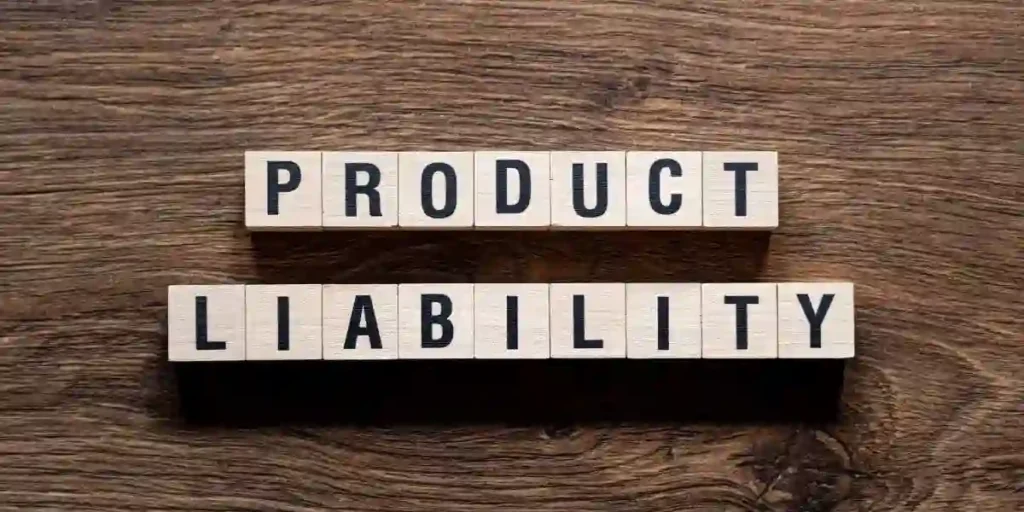 Product liability - word concept on building blocks, text used in PRODUCT LIABILITY - words on wooden blocks on a white background with a judge's gavel.