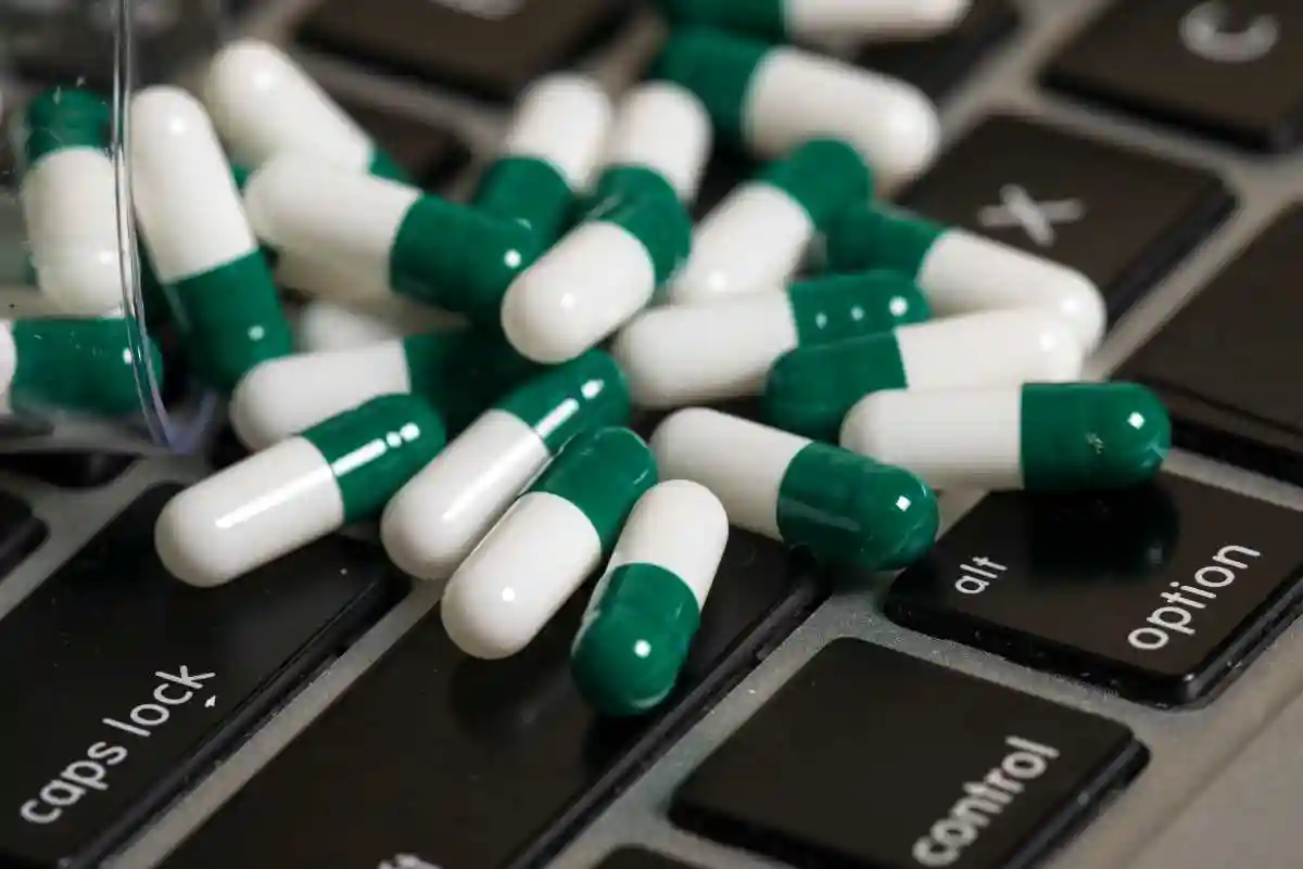 A notebook keyboard and some pills used in Pharmacy Medication Error Lawyer in Tennessee