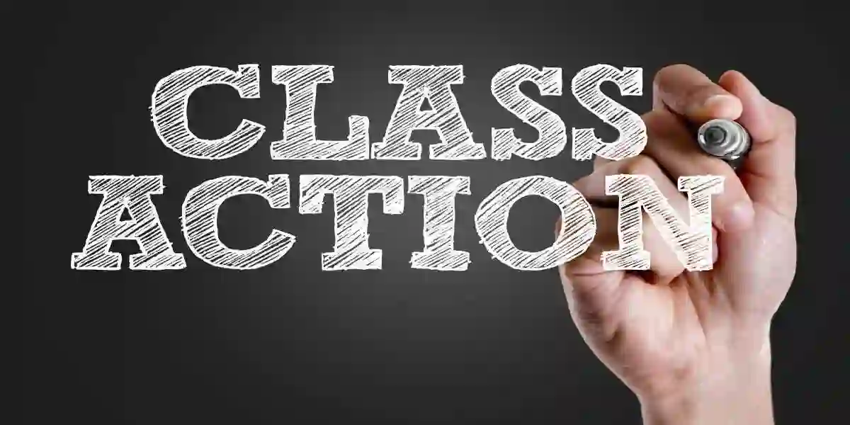 Hand writing the text: Class Action USED IN Guide to Securities Class Action Lawsuits