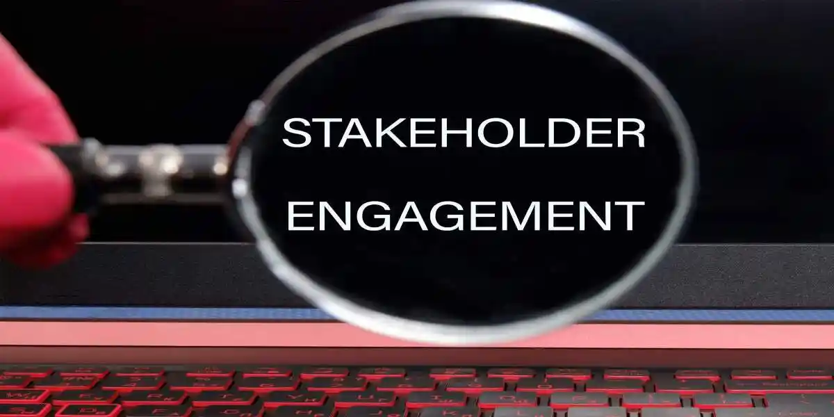 Business and financial concept. STAKEHOLDER ENGAGEMENT words written the phrase is highlighted on the black screen through a magnifying glass. Business concept. used in Shareholder Rights through Securities Litigation